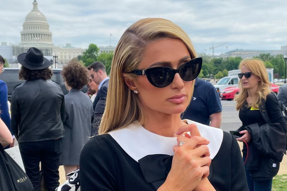 FILE - Paris Hilton meets with a supporters after speaking at a Stop Institutional Child...