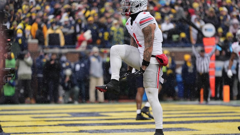 Ohio State wide receiver Brandon Inniss celebrates after scoring a touchdown during the first...