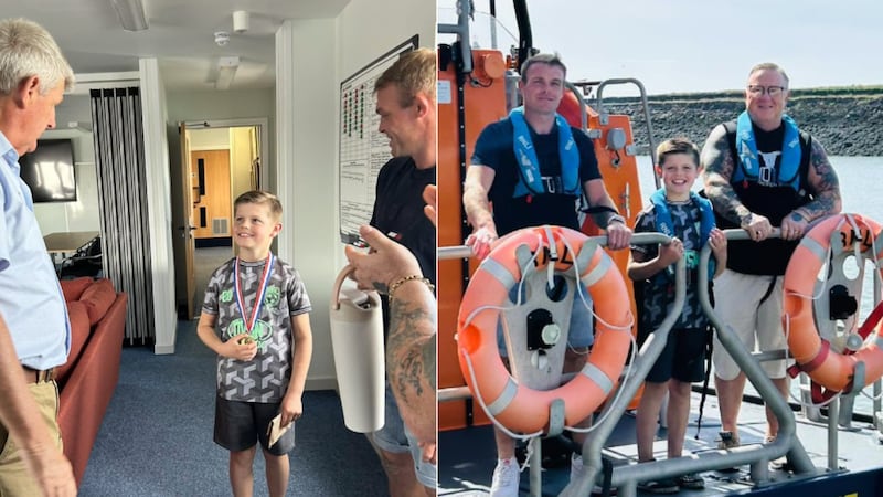An 8-year-old boy received a medal after he helped save his grandfather from drowning.